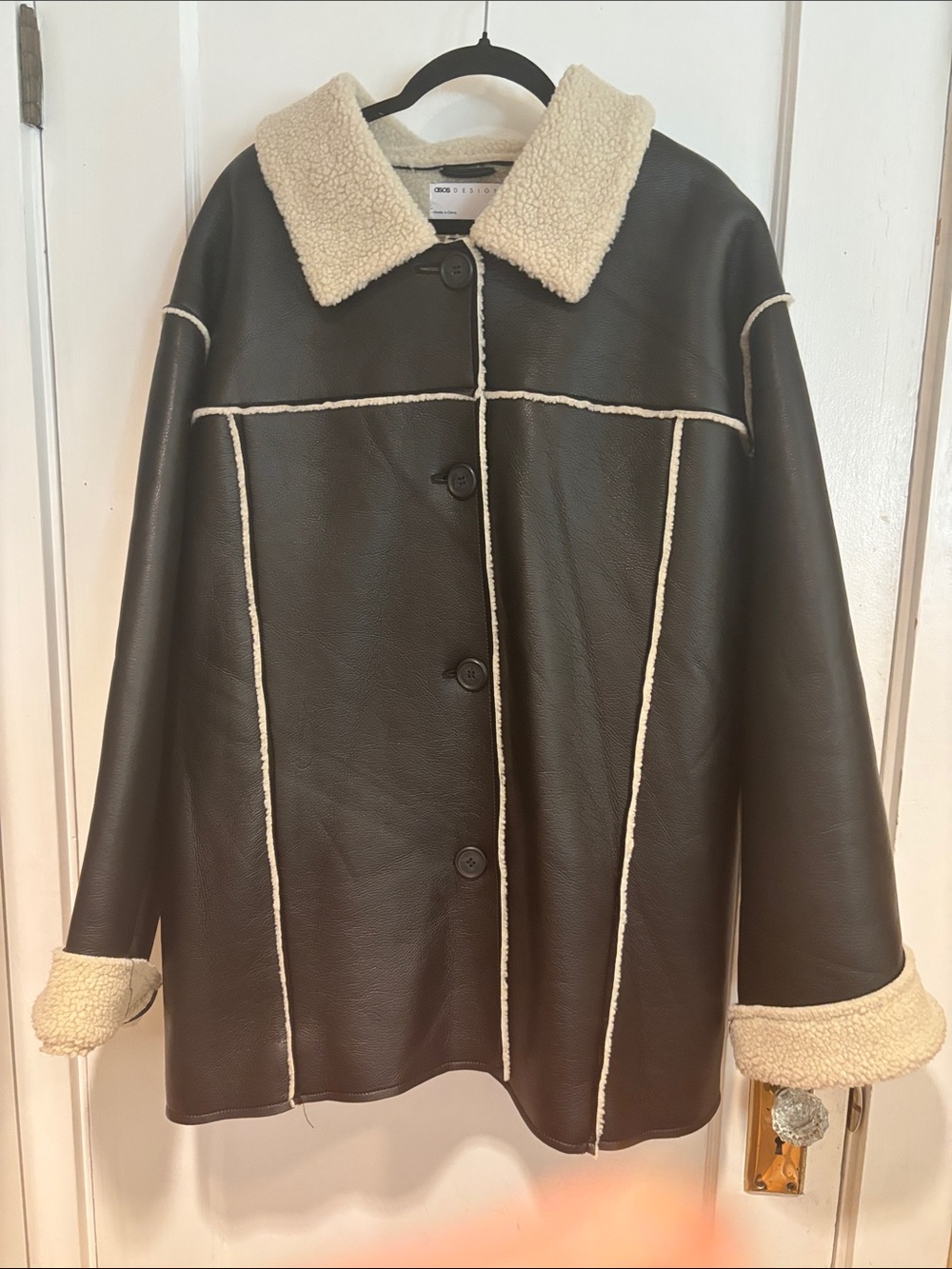 Woman’s Very Oversized Faux Black Leather.  Shearling Coat with Cream Trim